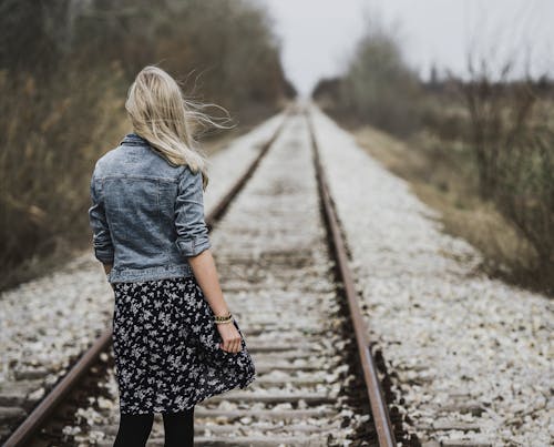 Free Woman Standing on Railroad Stock Photo