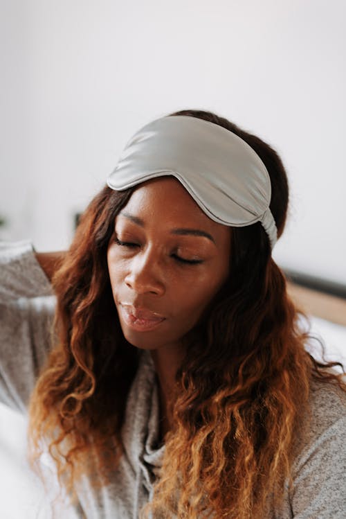 Free Woman with eye mask on forehead Stock Photo