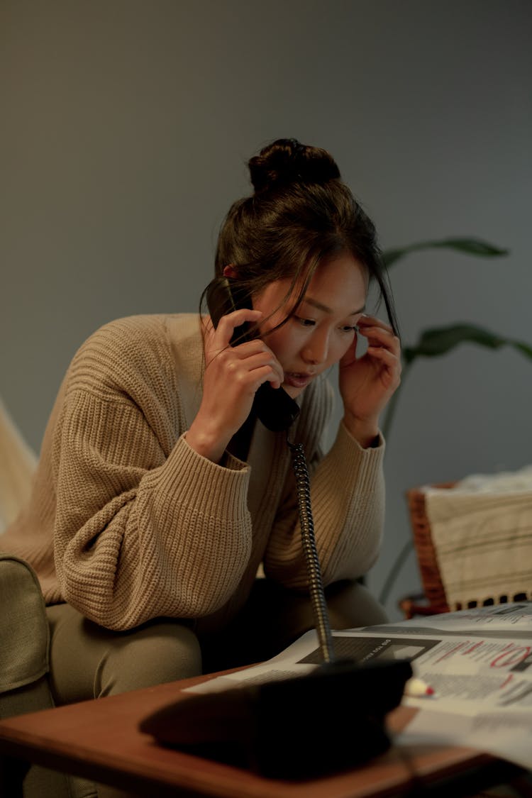 Unemployed Woman Talking On Phone