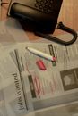Job opening marked in newspaper