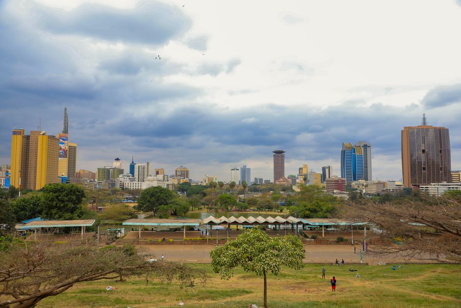 Scenic skyline view of Nairobi cityscape with iconic skyscrapers and lush greenery.