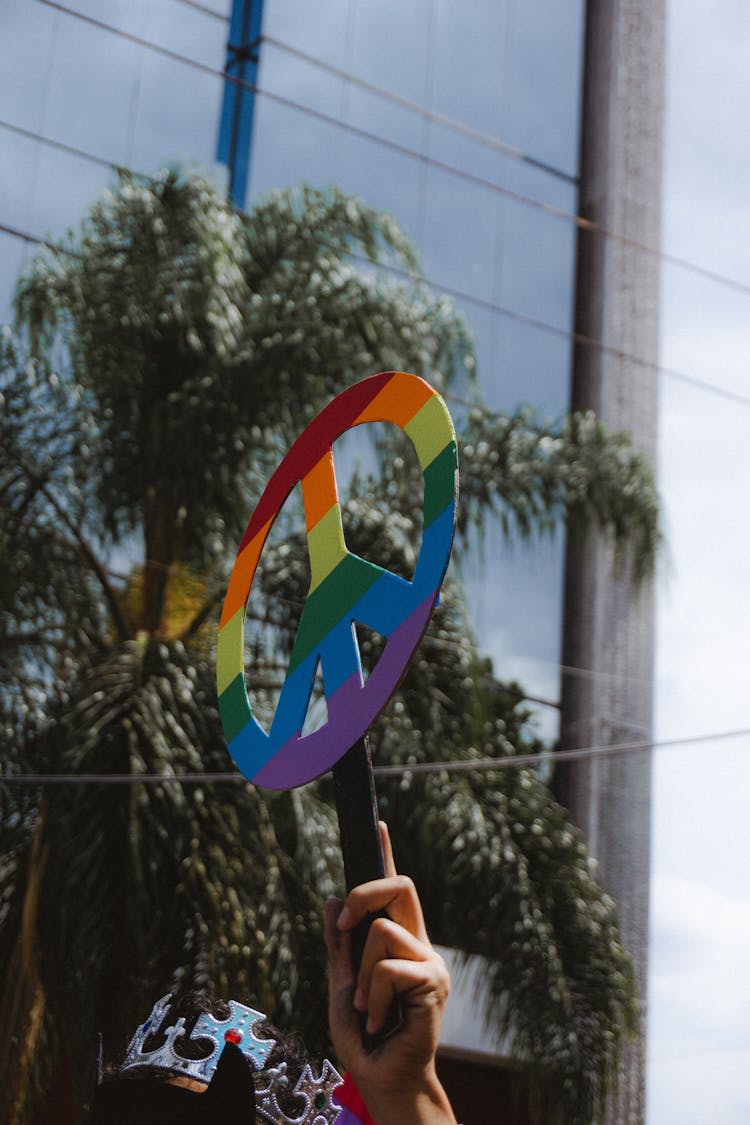 Close Up On Pride Logo Being Carried In Hand