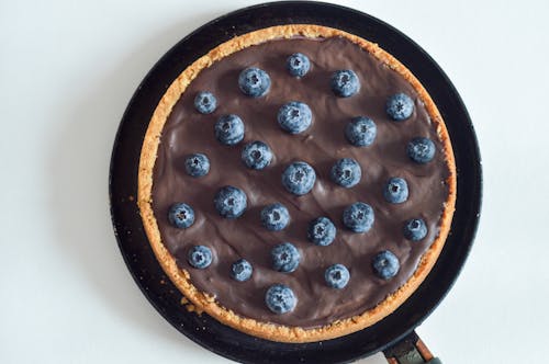 A Chocolate Pie with Blueberries on Top