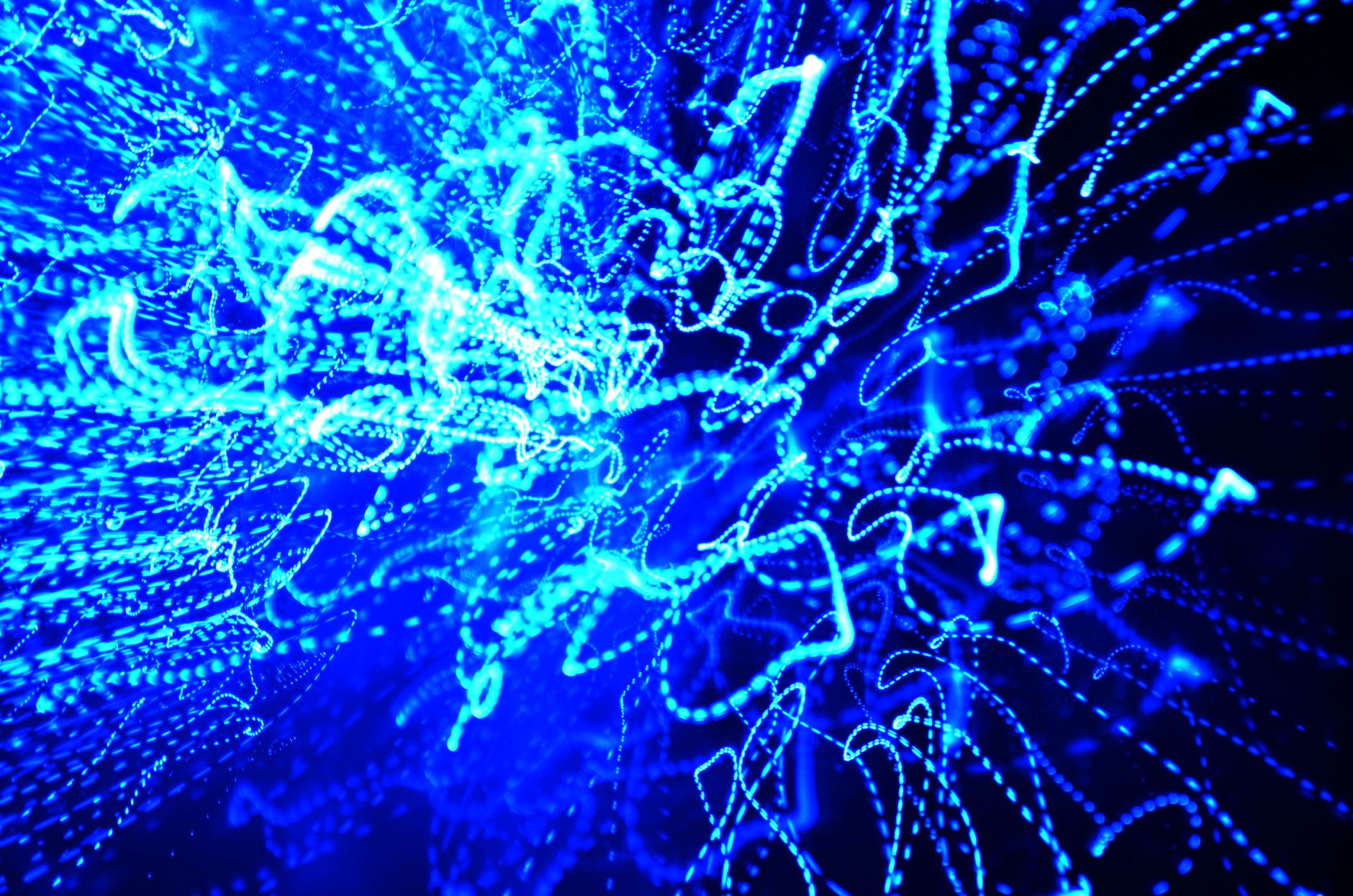 Vivid abstract image showcasing dynamic blue light patterns, perfect for creative design themes.
