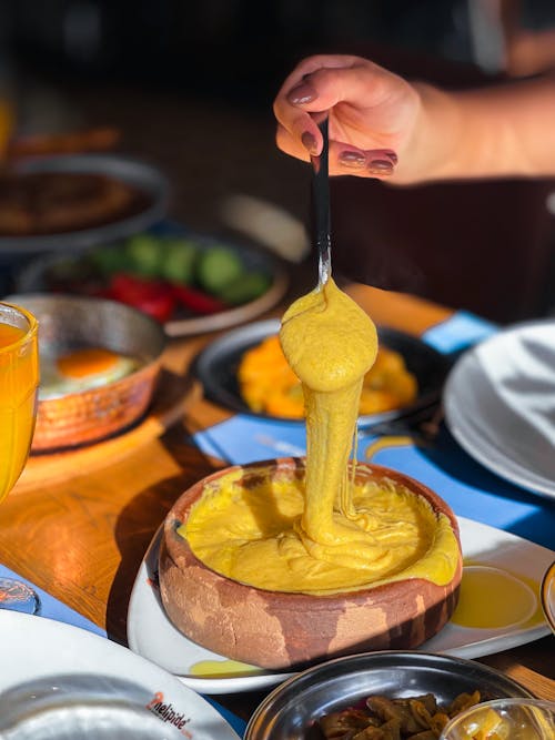 Foto stok gratis berwarna krem, fondue, makanan