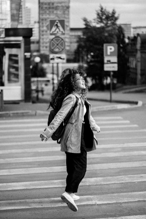 Free A Woman on a Pedestrian Lane  Stock Photo