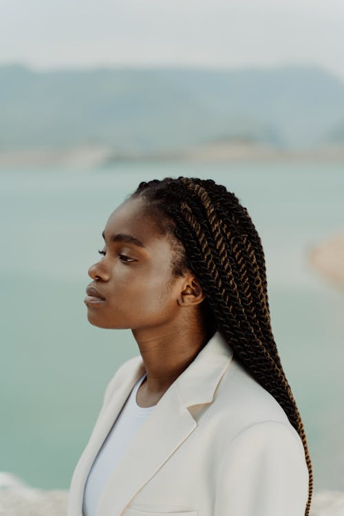 Portrait of an African Woman Wearing White Suit 