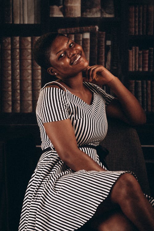 A Woman in a Striped Dress 