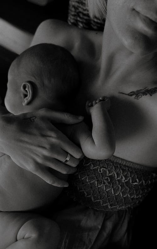 Ingyenes stockfotó alvás, anya és a baba, anyaság témában