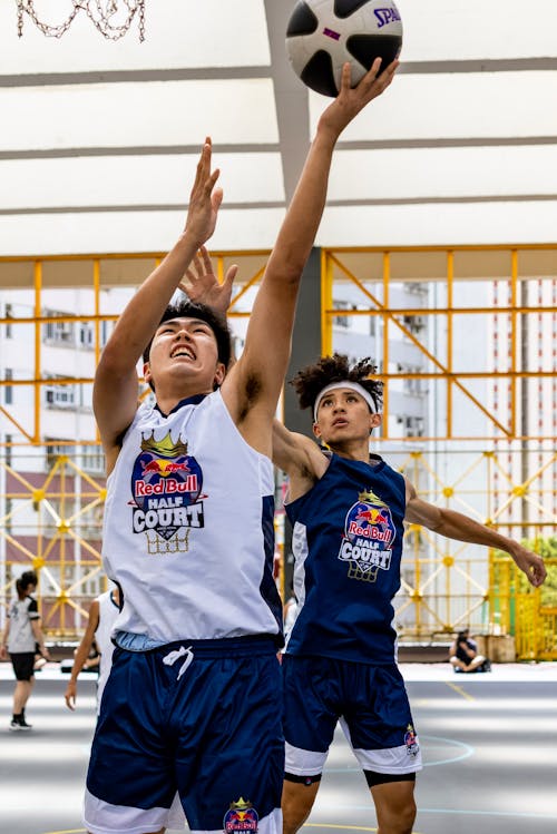 Photo of Men Playing Basketball