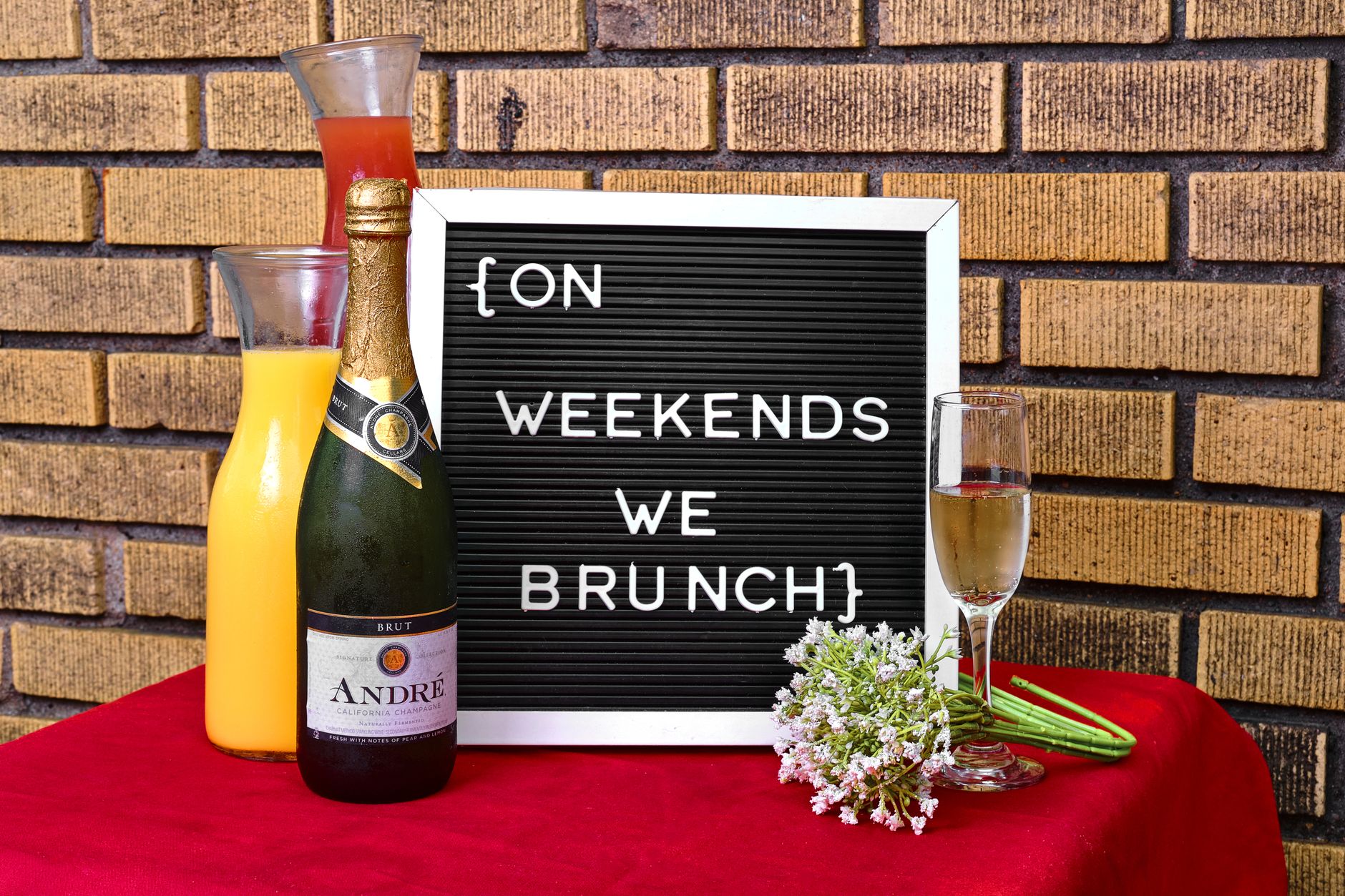 Orange Cream Mimosa served in champagne flute with strawberries