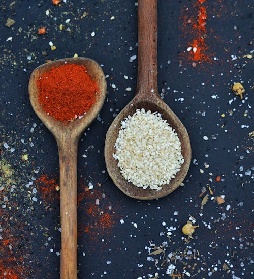 Free Close-Up Shot of Spices on a Wooden Spoon Stock Photo