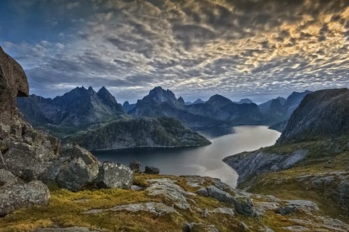 A Curvy River Surrounded by Mountains in Lofoten Islands, Norway 