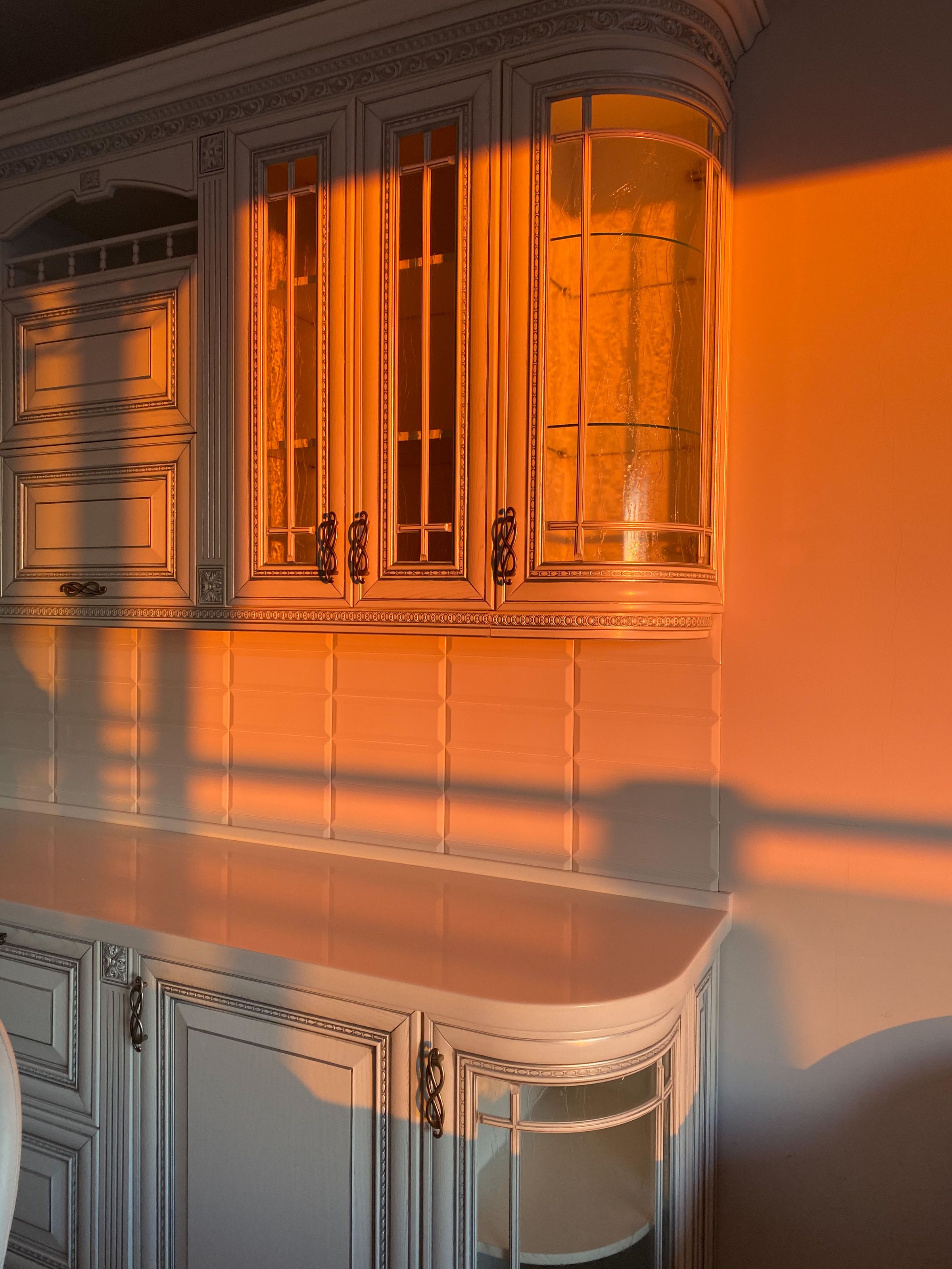 Luxury kitchen warmed by sunset light