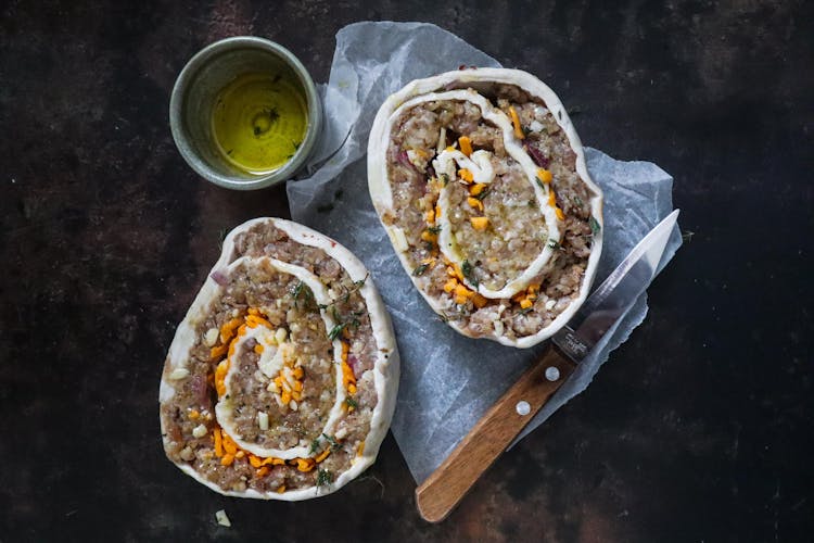 Dough With Ground Meat On Baking Paper