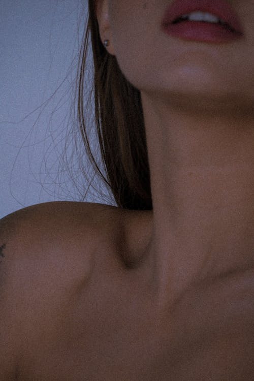 Close-up of a Woman Neck and Bare Shoulder