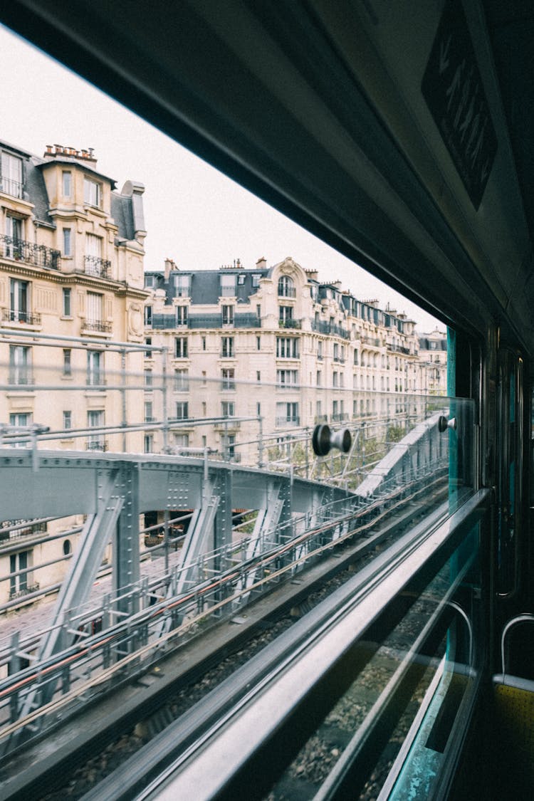 Train Passing Bridge Of Passy In Paris