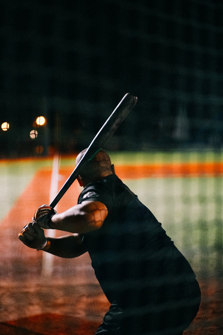 Man Playing Baseball