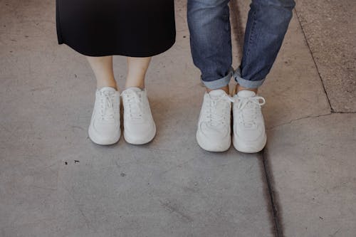 A Couple in White Nike Sneakers