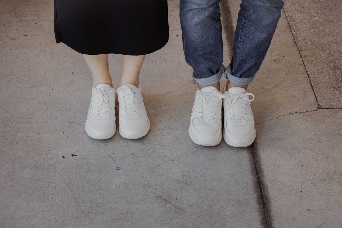 A Couple in White Nike Sneakers