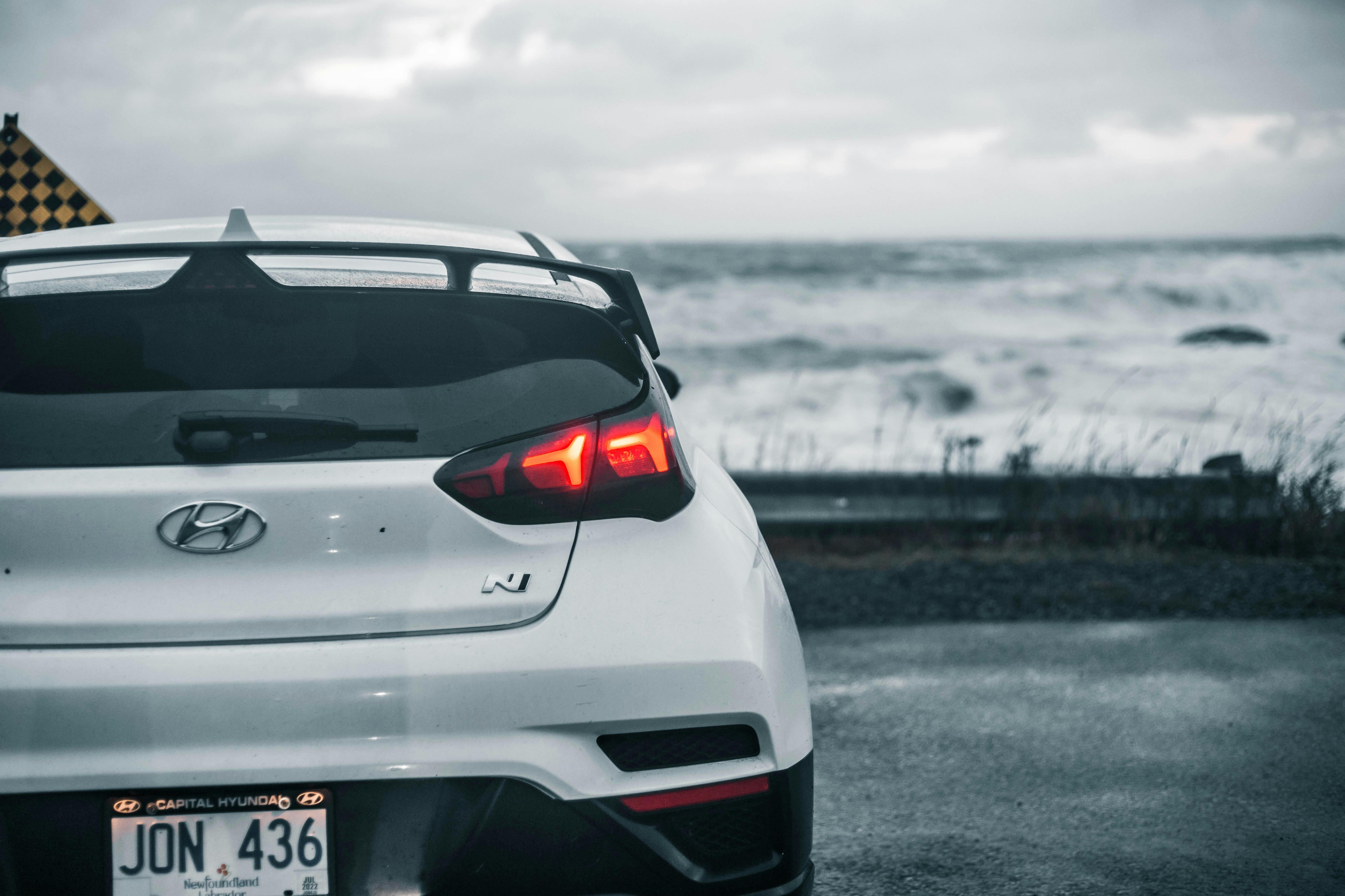 Photo of a White Hatchback Car · Free Stock Photo