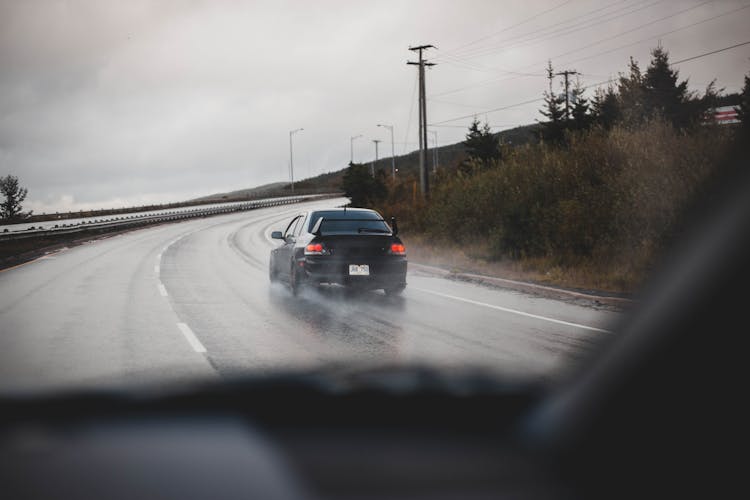 Driving Uphill On Wet Road 