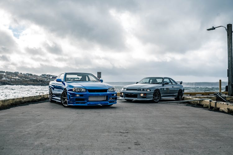 Nissan Sports Cars On Sea Shore