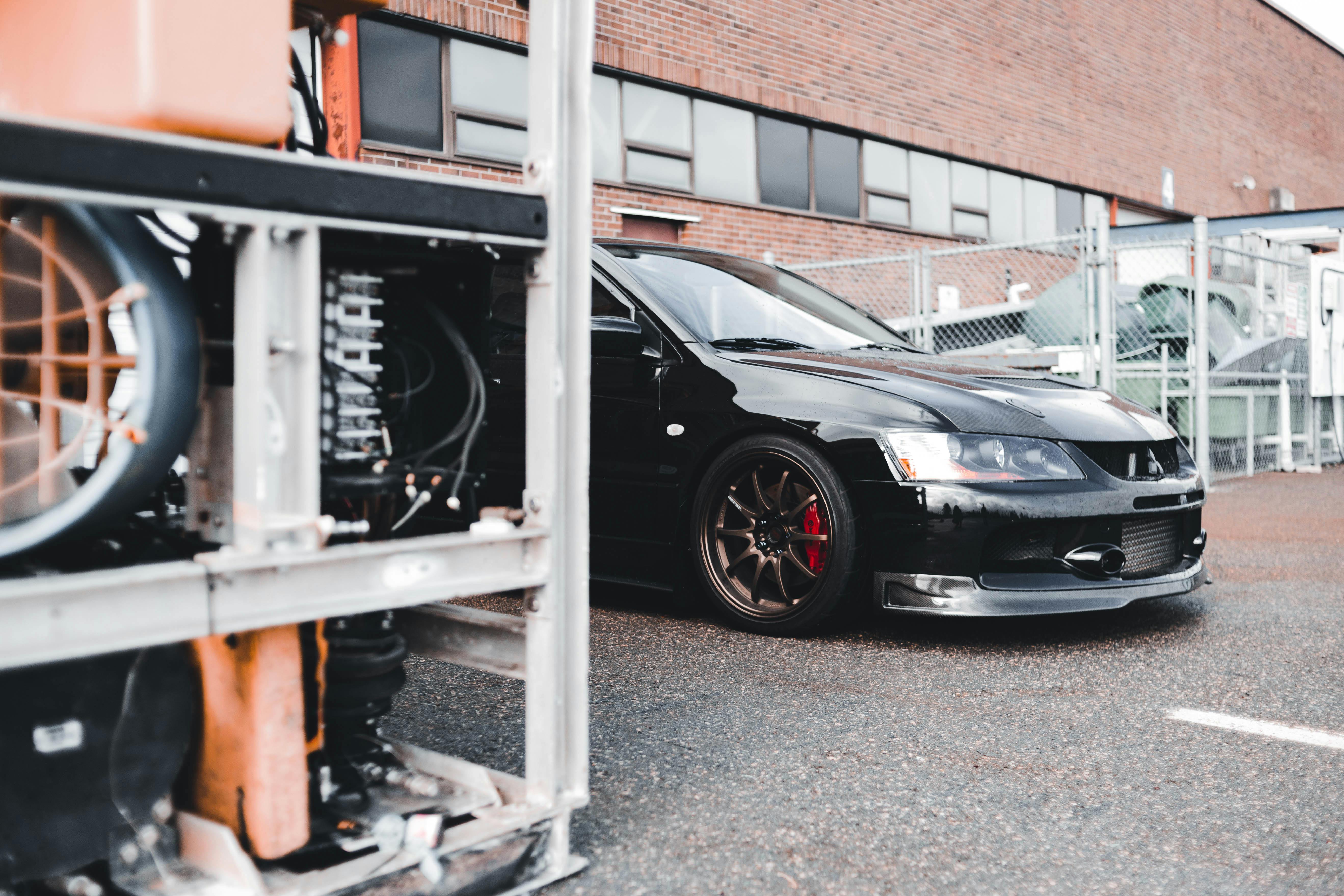 Mitsubishi Lancer Evolution in a Car Dealership · Free Stock Photo