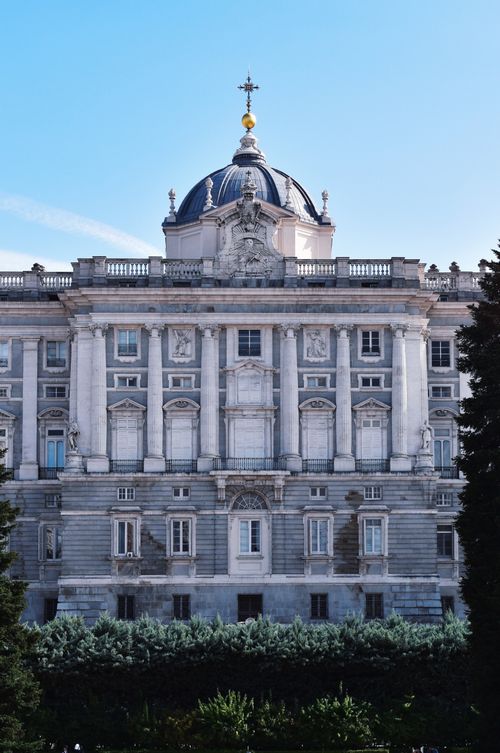 Free Elegant facade of the historic Royal Palace of Madrid under a clear blue sky. Stock Photo