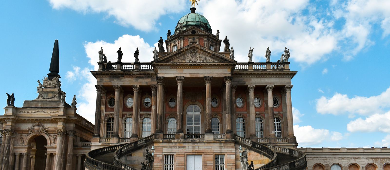 Stunning view of the University of Potsdam's baroque Neues Palais facade in Germany.