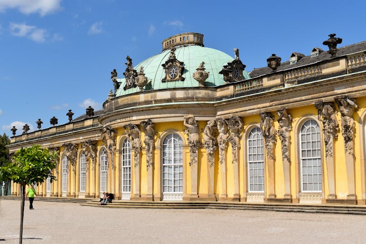 Sculptures On The Walls Of Sanssouci Palace In Potsdam Germany