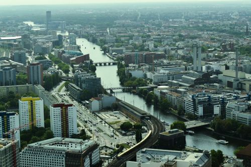 Free Stunning aerial shot of Berlin showcasing rivers, bridges, and modern architecture. Stock Photo