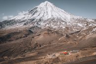 Trailers at a Bottom of a Mountain 