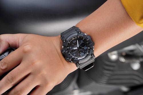 Free Person Wearing Black and Silver Chronograph Watch Stock Photo