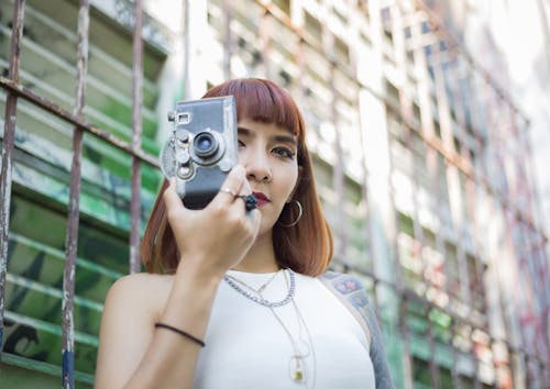 A Woman Holding a Camera