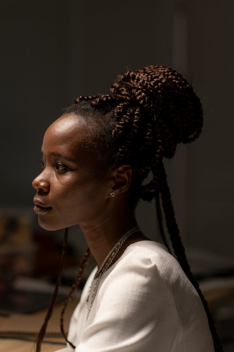 Profile Of Woman With Braids