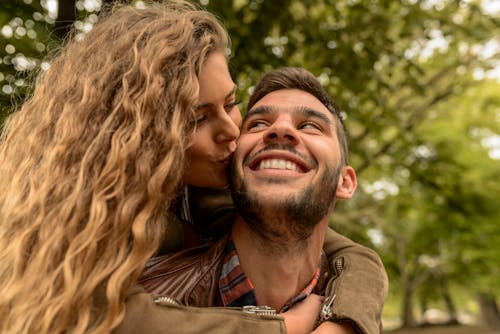 Free Woman Kissing A Man  Stock Photo