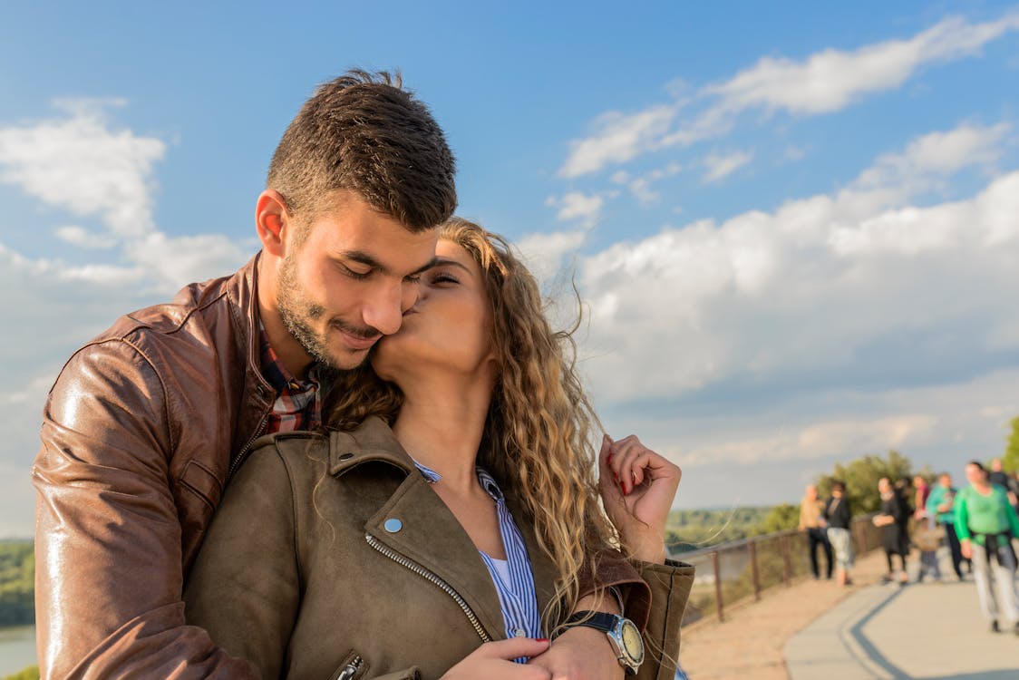 Woman Kissing Man