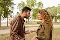 Man And Woman Wearing Brown Leather Jackets