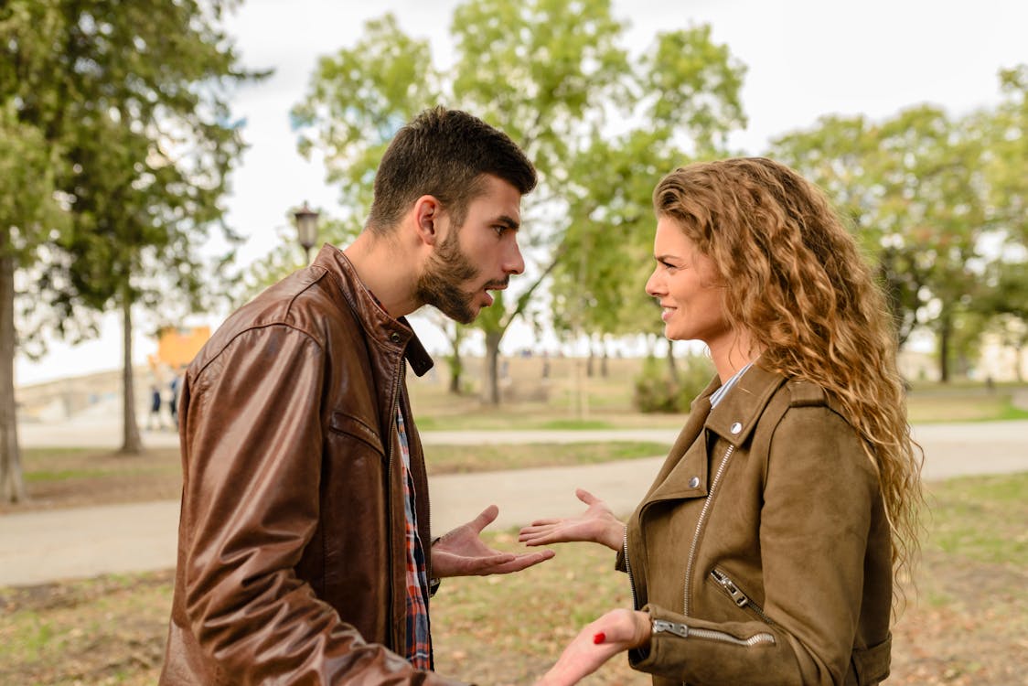 Free Man And Woman Wearing Brown Leather Jackets Stock Photo