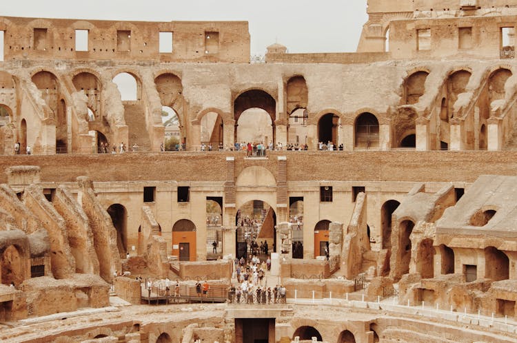 Tourists At The Colosseum In Rome