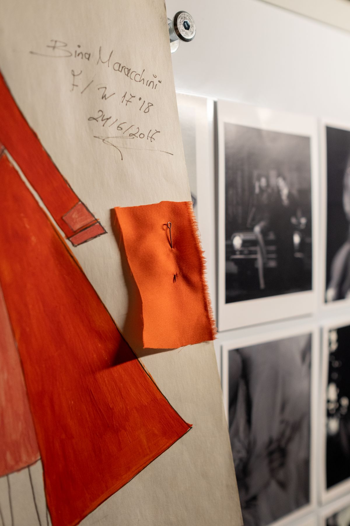 Fashion portfolio board with sketches and fabric sample