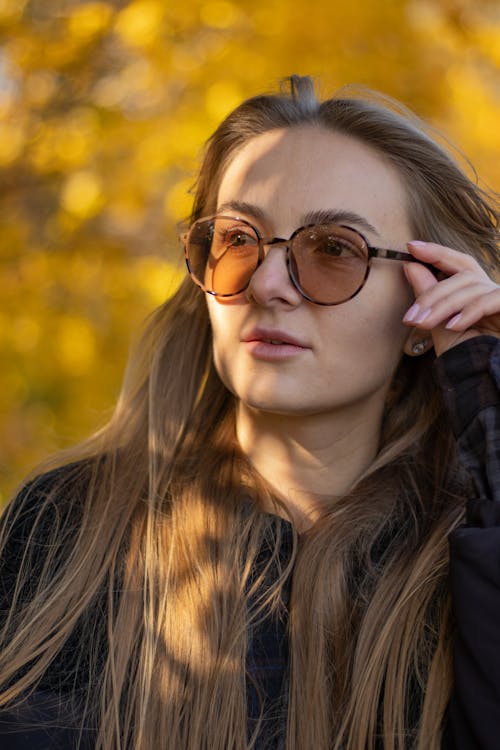 Close-Up Shot of a Woman Wearing Sunglasses