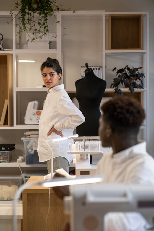 Man and Woman Working in a Tailor Shop 