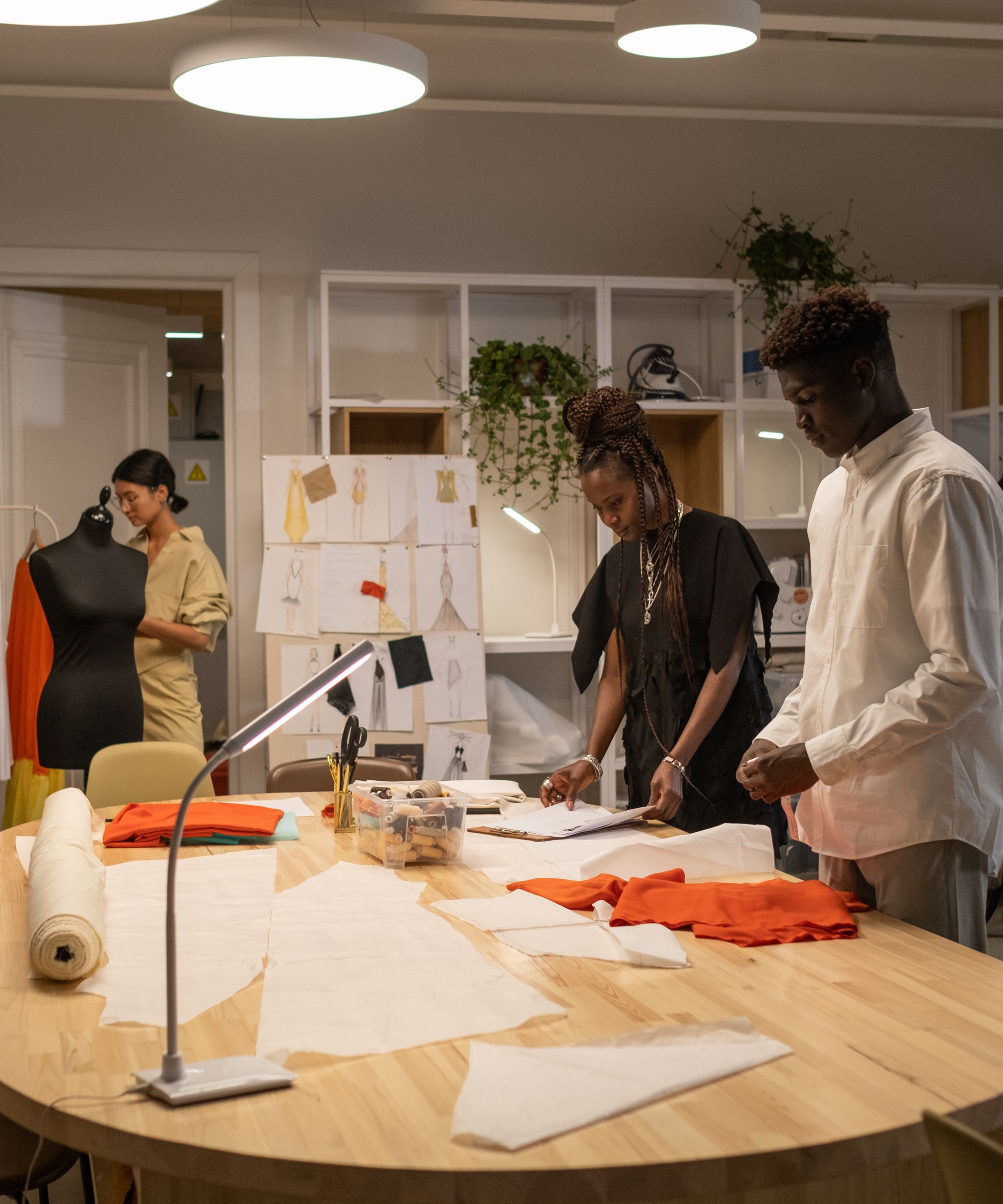 Fashion designer working on a garment