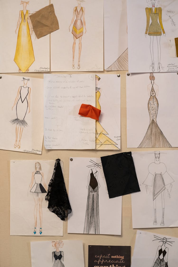 Fashion Sketches Hanging On A Wall 