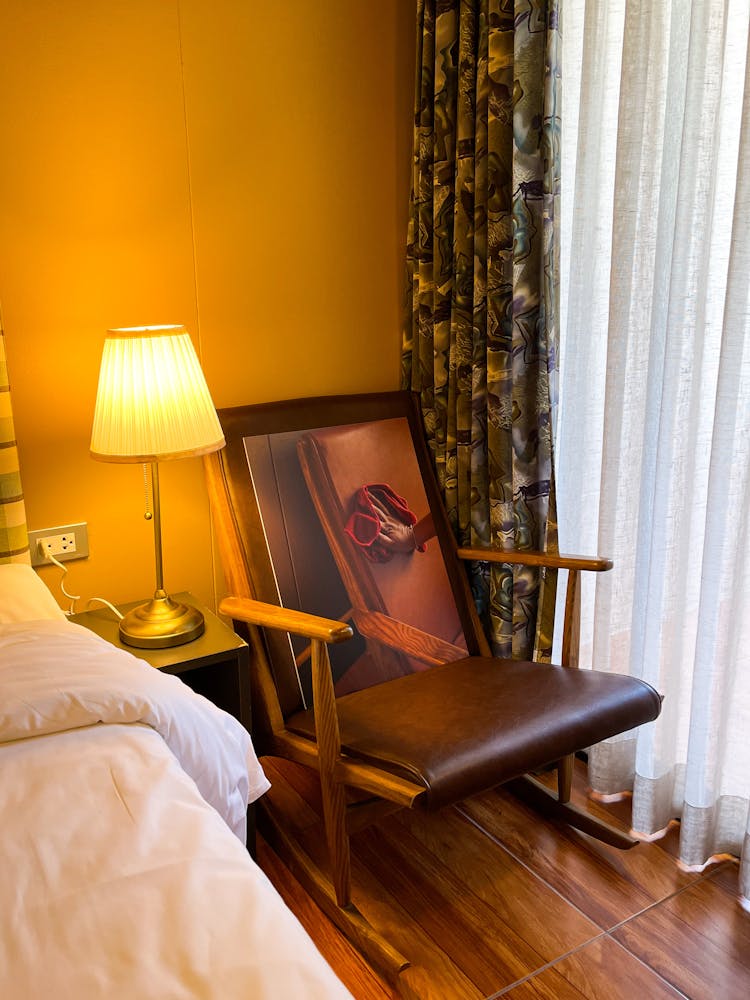 Painting In Chair In Bedroom