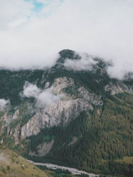 Scenic view of mist-covered mountains in Orcières, Provence-Alpes-Côte d'Azur, France.