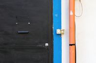 Black Wooden Door With Silver Door Lever