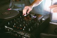Unrecognized Hand Pressing Button of Disc Jockey Console